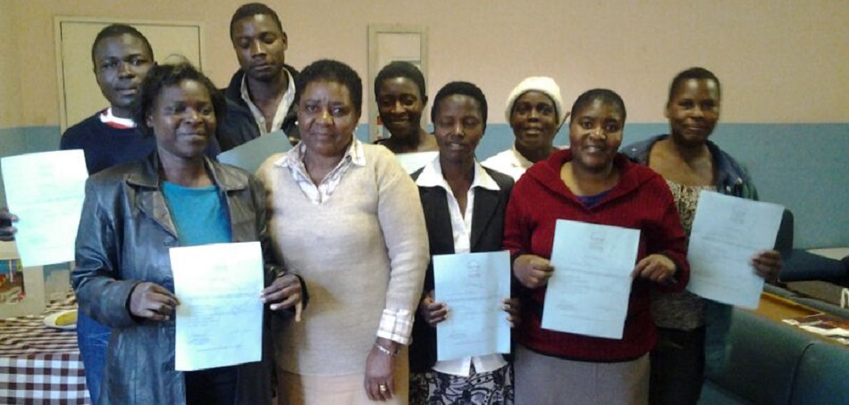 Attendance certificates proudly displayed